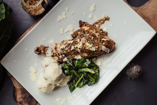 Remember this delicious dish? Guess what, it's back! Our Dijon-Roasted Chicken Leg is an all-time customer favourite. Juicy, delicious chicken leg smeared with grainy dijon, tender-roasted atop our rustic, skin-on mashed potatoes, paired with tangy sautéed greens. 🤤