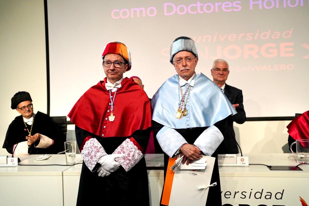 unizar's tweet photo. Los profesores de @unizar Luis Oro y Guillermo Fatás, son los dos primeros doctores Honoris Causa investidos por la @_usj_ de manos del rector @C_PerezCaseiras . Está pasando hoy miércoles 30 en el aula magna de la F. de CC. de la Salud del campus de Villanueva de Gállego. https://t.co/3BryEQVzSv