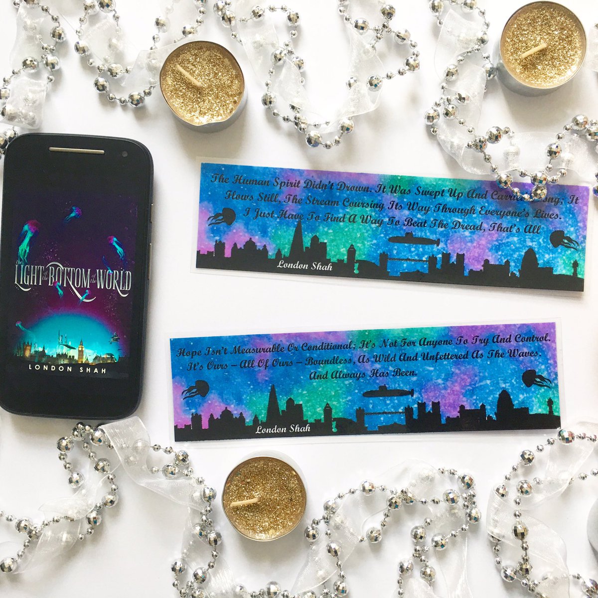 thetsundokuc's tweet photo. New bookmark alert! 

I’ve added a bookmark inspired by The Light at the Bottom of the World by @London_Shah to my shop!

You can buy it here:

https://t.co/ANvryVhRvc

#LightTheAbyss https://t.co/VveVygHa38