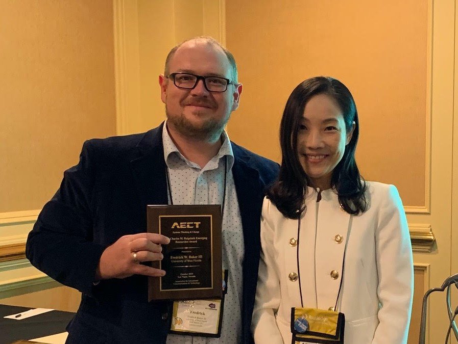 FredWBaker's tweet photo. Thankful to have received the Charles M. Reigeluth Emerging Researcher Award from the Systems Thinking & Change Division at #AECT19! #aectstc! And my colleague was able to present it! https://t.co/5BtvA2X5Rz