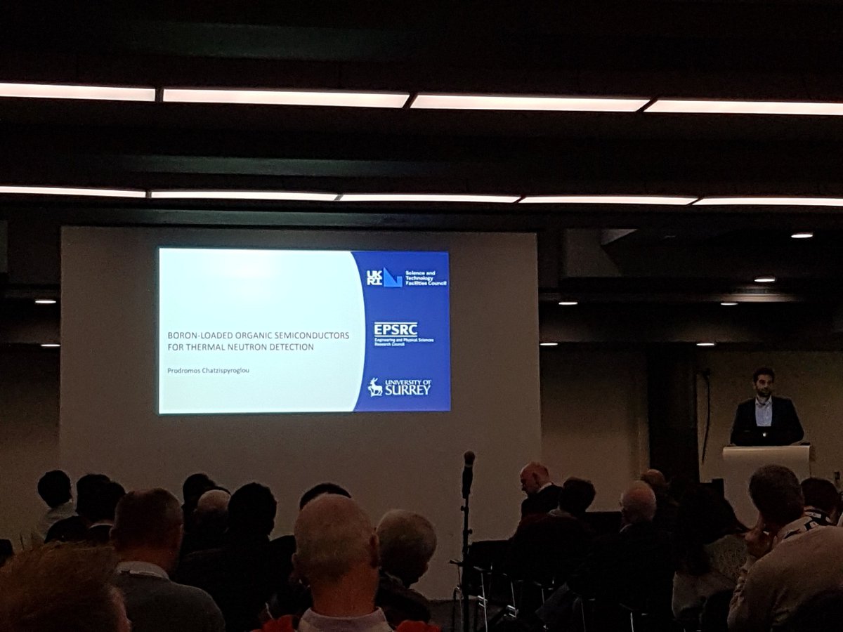 MattTaggart's tweet photo. And now with lighting to set the mood, we have another #SurreyRadMed student, Prodromos, discussing his PhD. @PhysicsatSurrey #IEEE2019 https://t.co/kfPdYNlbYO