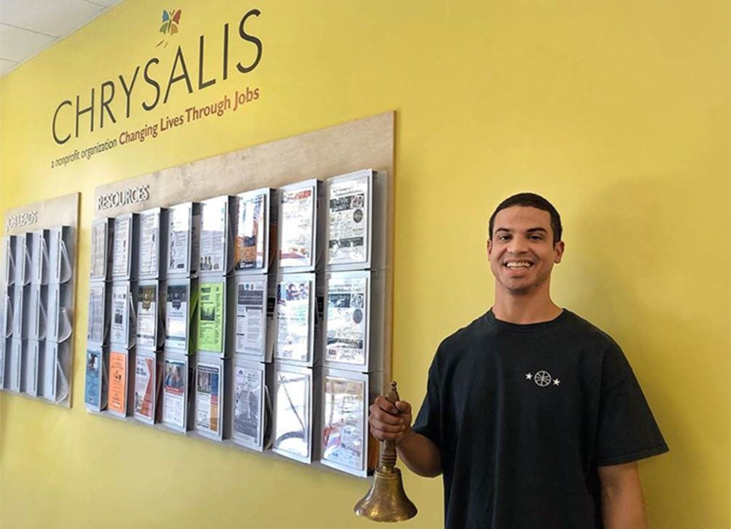 ChrysalisSoCal's tweet photo. With a smile on his face, John rang the #SuccessBell at our San Fernando Valley center to celebrate his new valet attendant position at the Burbank Airport Marriott hotel!
#ChangeLives #SuccessBells #MoreThanAJob https://t.co/2hyYCC3tJy