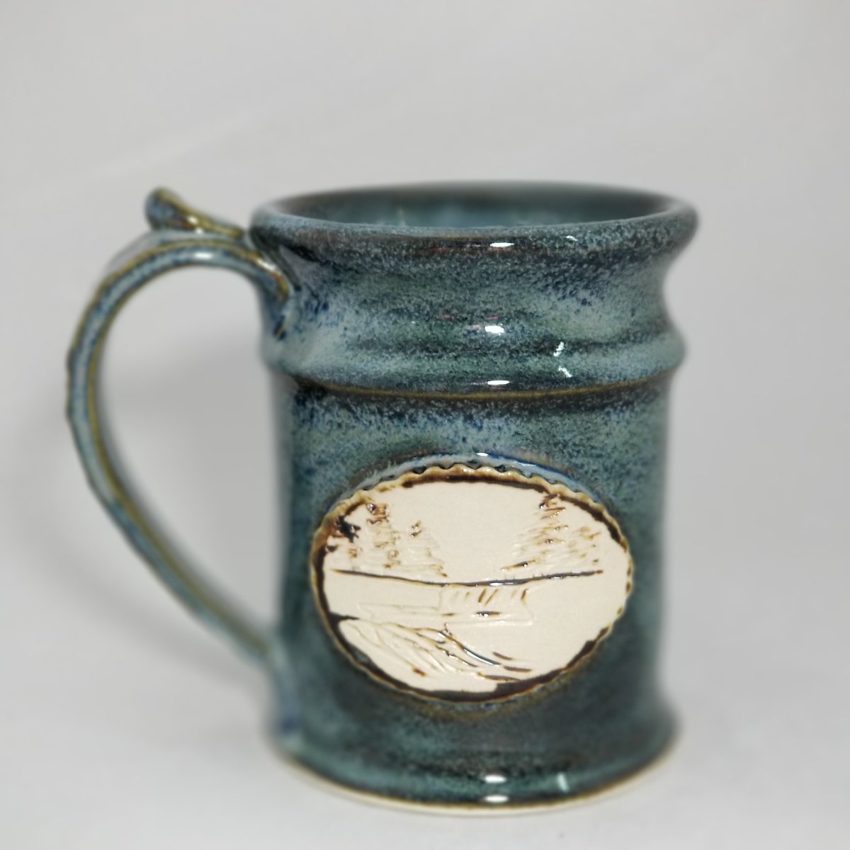 MuditisPottery's tweet photo. Carved stein...has a stream carved into it. Holds 14 to 16 oz of beverage. Message me if interested or come see me over on Facebook. Still working on my website.
#coffee #tea #CoffeeLover #stein #smokymountains #Tennessee #pigeonForge #mug #cup #womaninbusiness #howicreate https://t.co/0W7ooXldXb