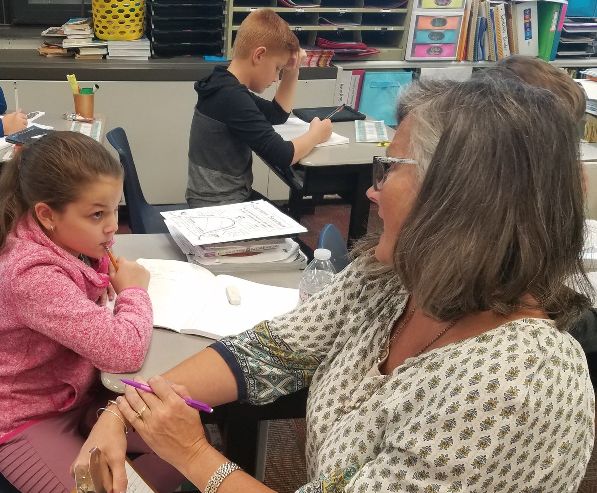 PrincipalMiaMc's tweet photo. Mrs. Judd conducts writing conferences to check students' understanding of the five essential writing elements in a narrative. #instructionalcoaching #DevelopingWriters #FCSCSpartanPride #FrazeeElite https://t.co/RdqL3iCkaw