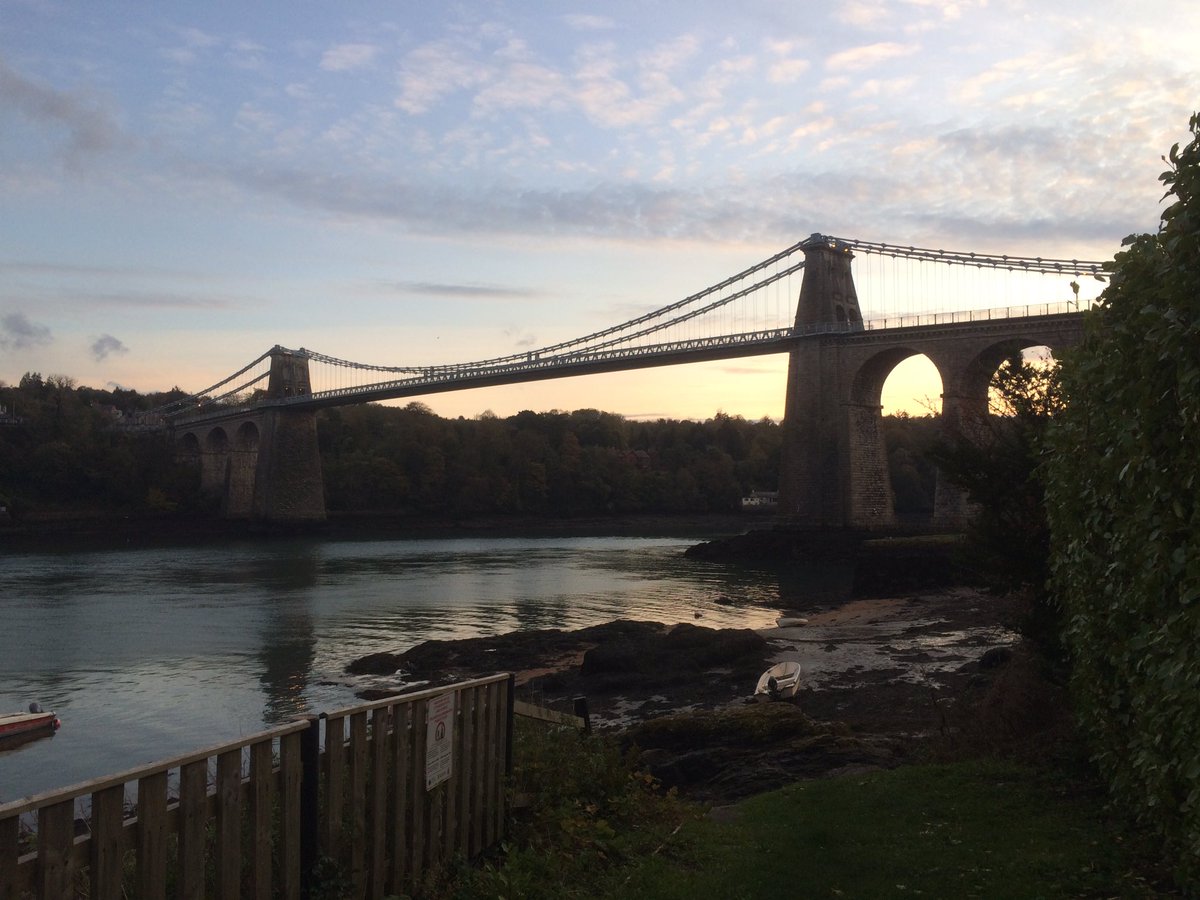 Checking out some of the finest Victorian industrial architecture in the world today, as we hiked on the Anglesey coast path alongside the Menai Straits. Magnificent view of Telford’s bridge below, taken from right on the path.