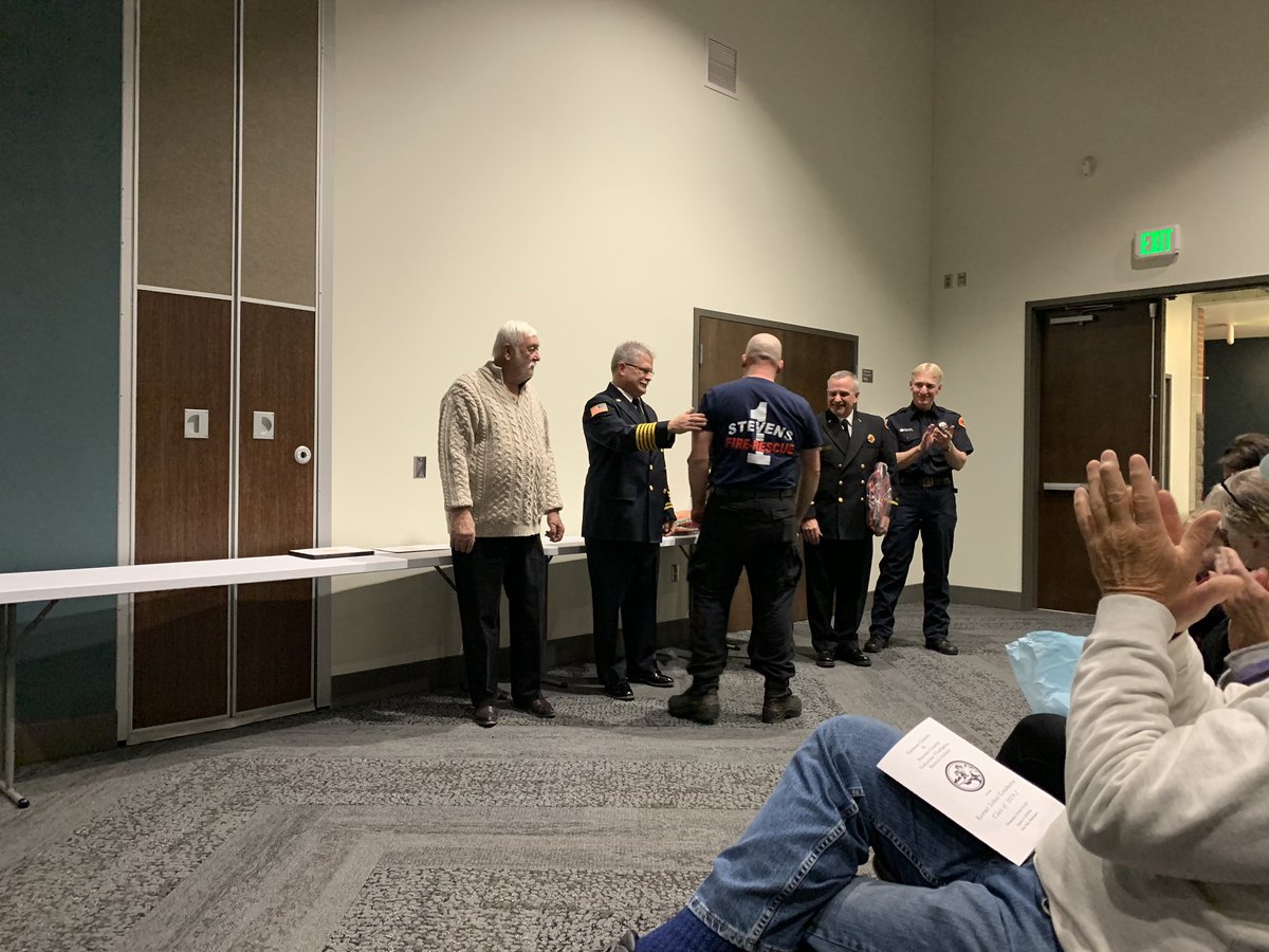 SpokaneCoFire4's tweet photo. Presenting the diplomas. Some lucky recruits were able to receive their diplomas from family members in the fire service #fireisfamily @SCFD9 https://t.co/YozyaykVpN