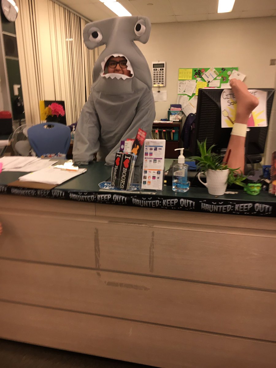 RCILibrary's tweet photo. Sometimes sharks volunteer in the library!!! Happy Halloween 🎃👻☠️ https://t.co/imMCfwmoXJ
