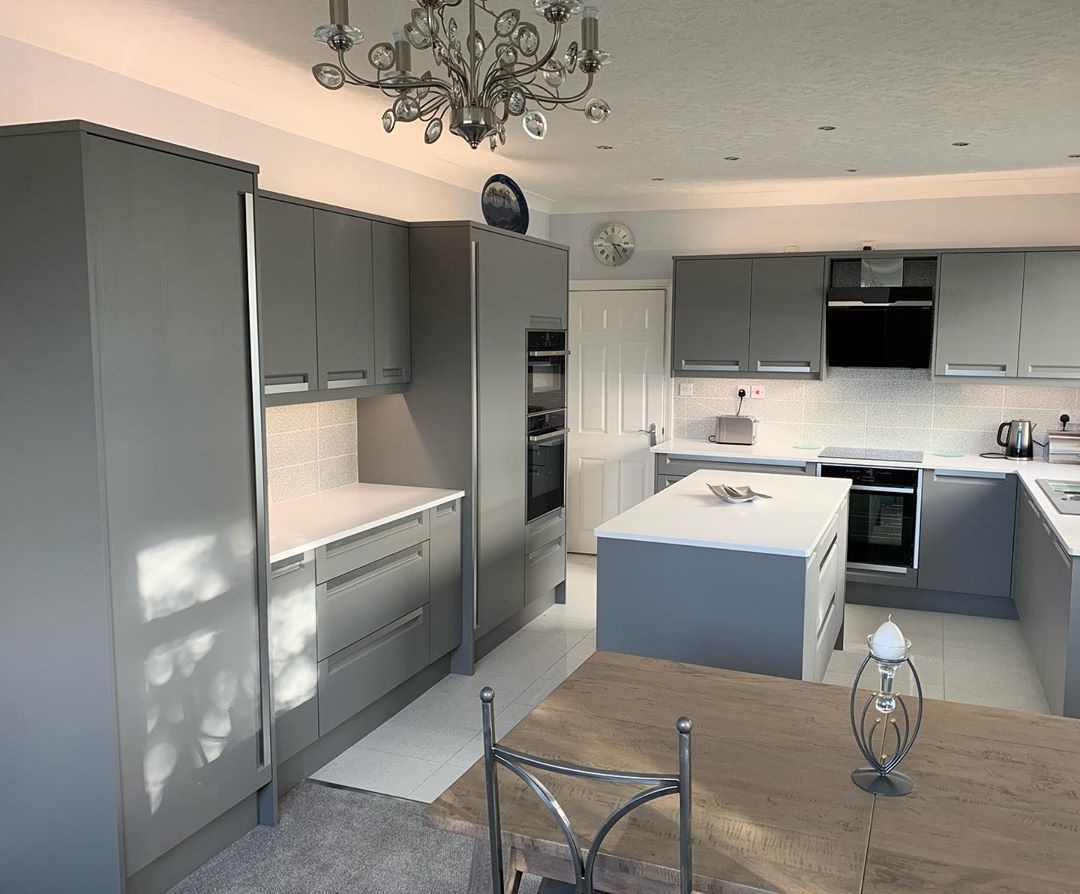 #MISTRALHighlights - This kitchen's understated beauty is a result of a consistent and well balanced colour scheme. MISTRAL Polaris work surfaces feature alongside a number of stunning silver elements, breaking up the deep grey tones that run throughout this stunning kitchen.