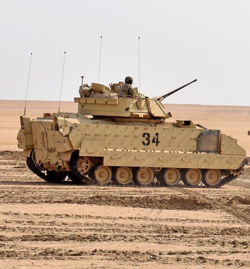 OIRSpox's tweet photo. .@USArmy troops in 4-118th Infantry Regiment, @30thabct, @NCNationalGuard attached to the 218th Maneuver Enhancement Brigade, @SCNationalGuard, load M2A2 Bradley Fighting Vehicles to support the @CJTFOIR mission in Deir ez Zor, Syria. #DefeatDaesh https://t.co/ZbFsvIemRW