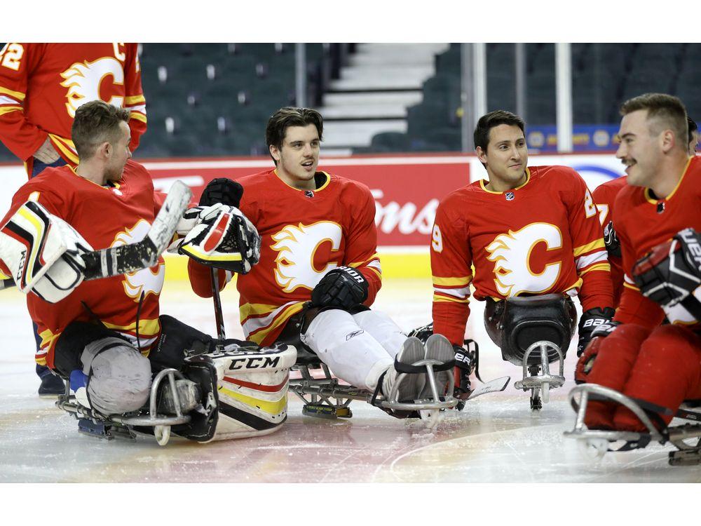 Flames take sledge team under their wing bit.ly/34dYwrt #yyc #Flames