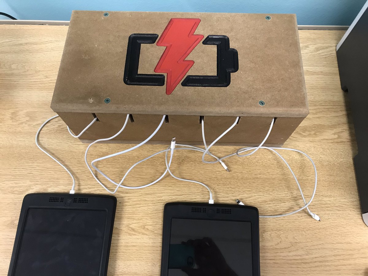AMSSLibrary's tweet image. Need to charge your iPad? Come to the library’s new charging station, courtesy of the talented Mr. Hanly!
