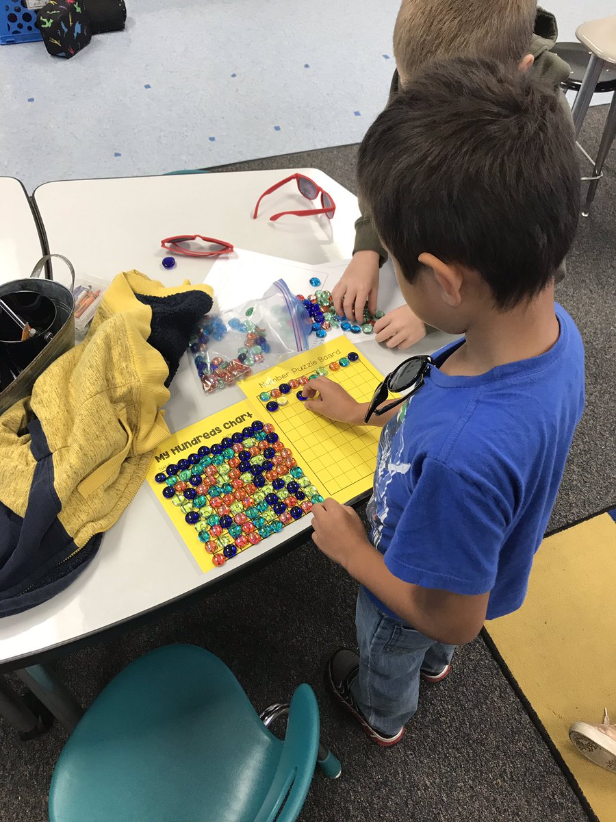 Mrs_EbertK's tweet photo. We’ve really been working on our counting collections routines and procedures. Counting collections are a great way to differentiate for all learners. We have kiddos counting by ones, 10s, 100s, and even adding two digit numbers using place value! @Hall_Hawks #cvproblemsolving https://t.co/c71dNtMymz