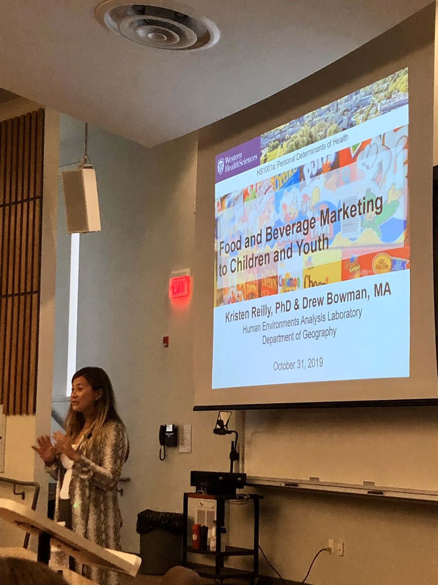 krisreilly_'s tweet photo. @DrewBowman16 and I had the pleasure of guest lecturing about #foodmarketing to children and youth in @ShaunaMBurke’s first year undergrad course today. Great to be back in the classroom with such an engaged group of health sci students! https://t.co/qVkrW1Z23D