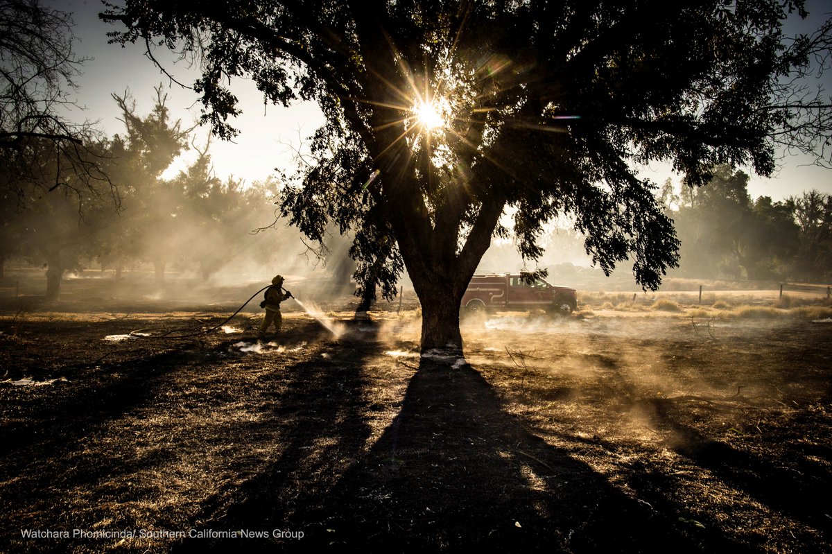 watcharaphotog's tweet photo. A CalFire firefighter mops up hot spots at the Louis Robidoux Nature Center in Riverside as the #46thFire swept the area. https://t.co/lPB0GJSxP6