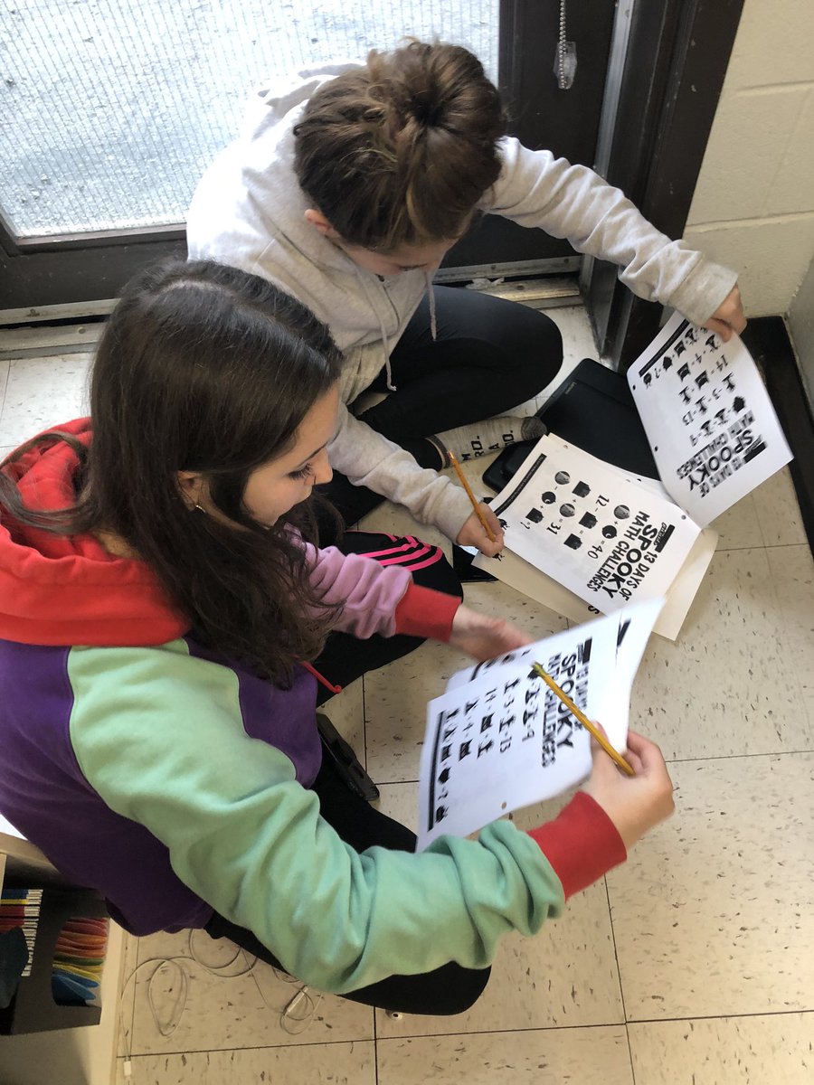 Ms_S78_LDSB's tweet photo. Math class was spent working our way through spooky math mashup. Such rich dialogue happening between groups as they discuss possible solutions. #mathisfun #spookymath #patterningandalgebra #teamworkmakesthedreamwork https://t.co/6PEqla4r8W