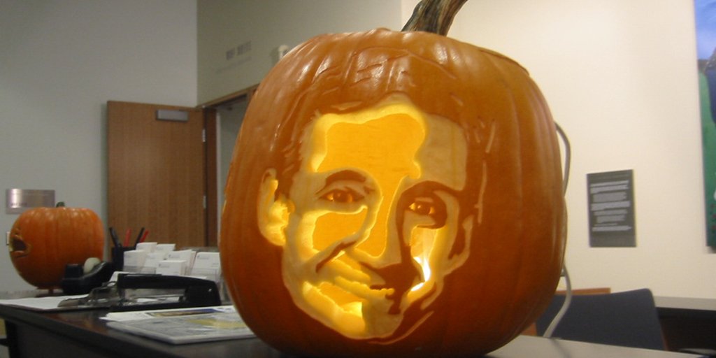Man's face carved into a jack-o-lantern