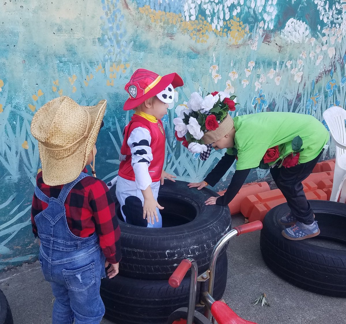 MEIPPPandas's tweet photo. This morning, a farmer👨‍🌾, Marshall🐾, and a rose bush 🌹 were spotted stacking tires on the play yard! #HappyHalloween https://t.co/Pbb2VN2qMt