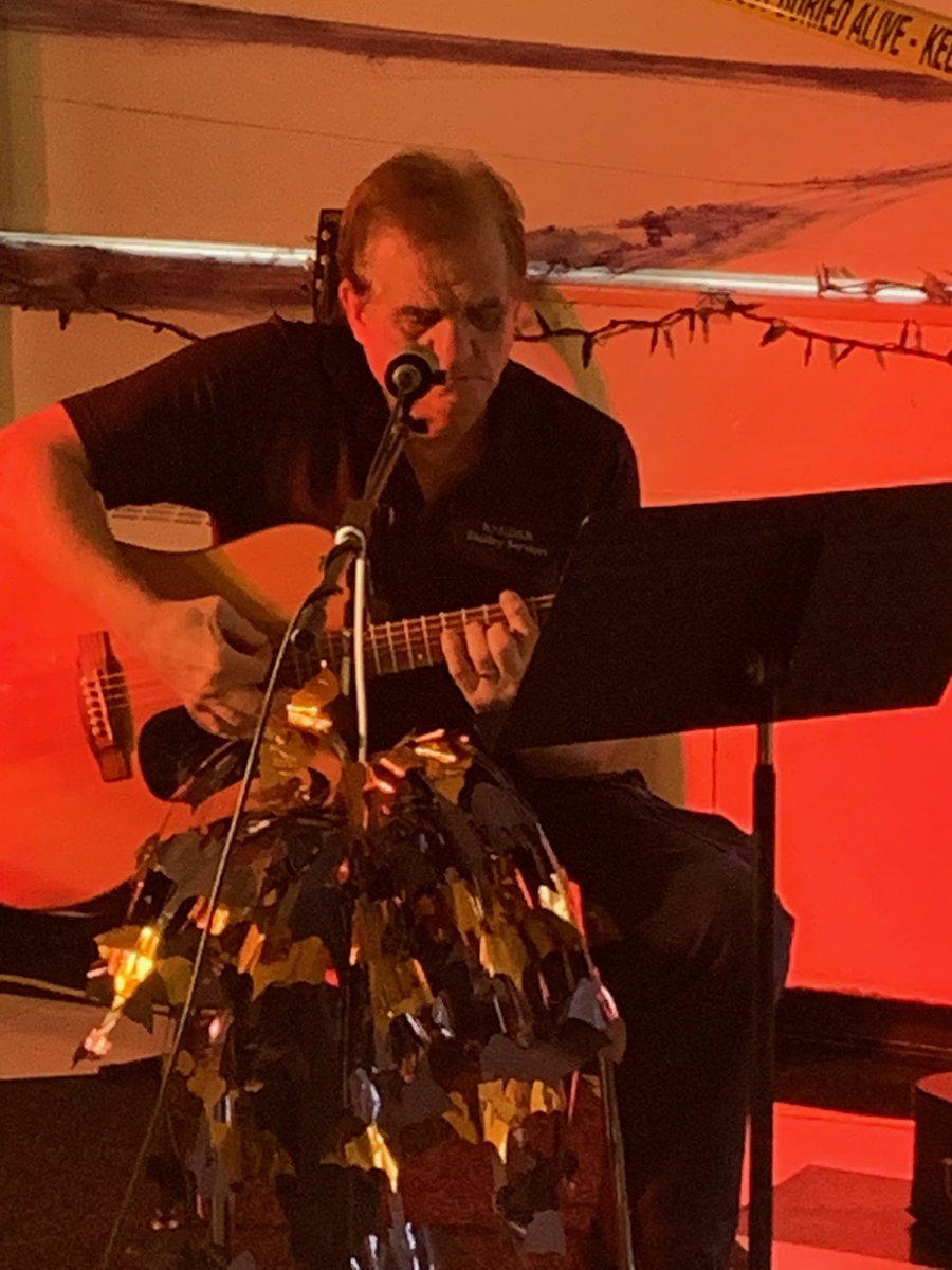 Trenton_HS's tweet photo. After a day of Halloween Hijinks we are getting ready for our Coffee House! Lead Hand Kevin Dishart on the guitar! https://t.co/dqjjB8ej95