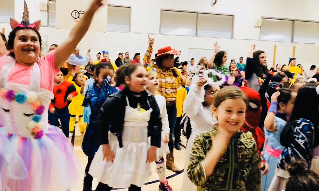 ArtWithMsBell's tweet photo. It was a very festive day at this elementary school!  You name it, we had it:  hot dogs, police officers, every super hero under the sun, and I even found my sidekick, Ms. Belle!  Thanks to our awesome admin team for planning and facilitating a fun, memorable day!  #starkstars https://t.co/el79IBANpa
