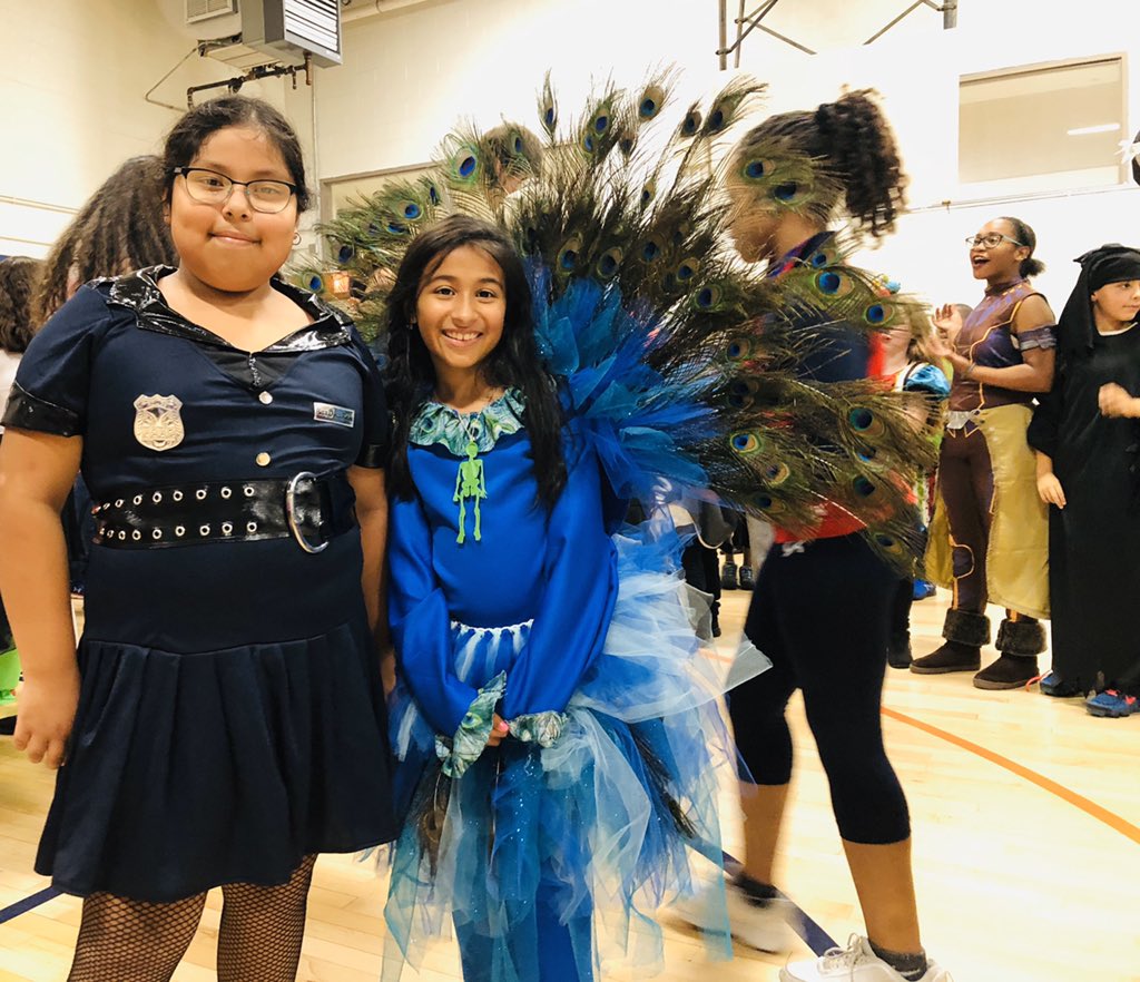 ArtWithMsBell's tweet photo. It was a very festive day at this elementary school!  You name it, we had it:  hot dogs, police officers, every super hero under the sun, and I even found my sidekick, Ms. Belle!  Thanks to our awesome admin team for planning and facilitating a fun, memorable day!  #starkstars https://t.co/el79IBANpa