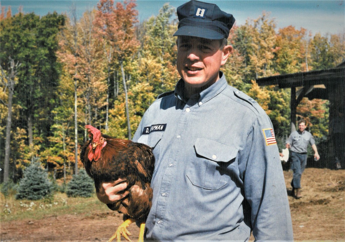 alertacademy's tweet photo. Basic Training Unit 9 throwback! Captain Dan Chapman, Commanding Officer of Basic Training, holding a chicken.

#ThrowbackThursday https://t.co/i0yRaLojtB