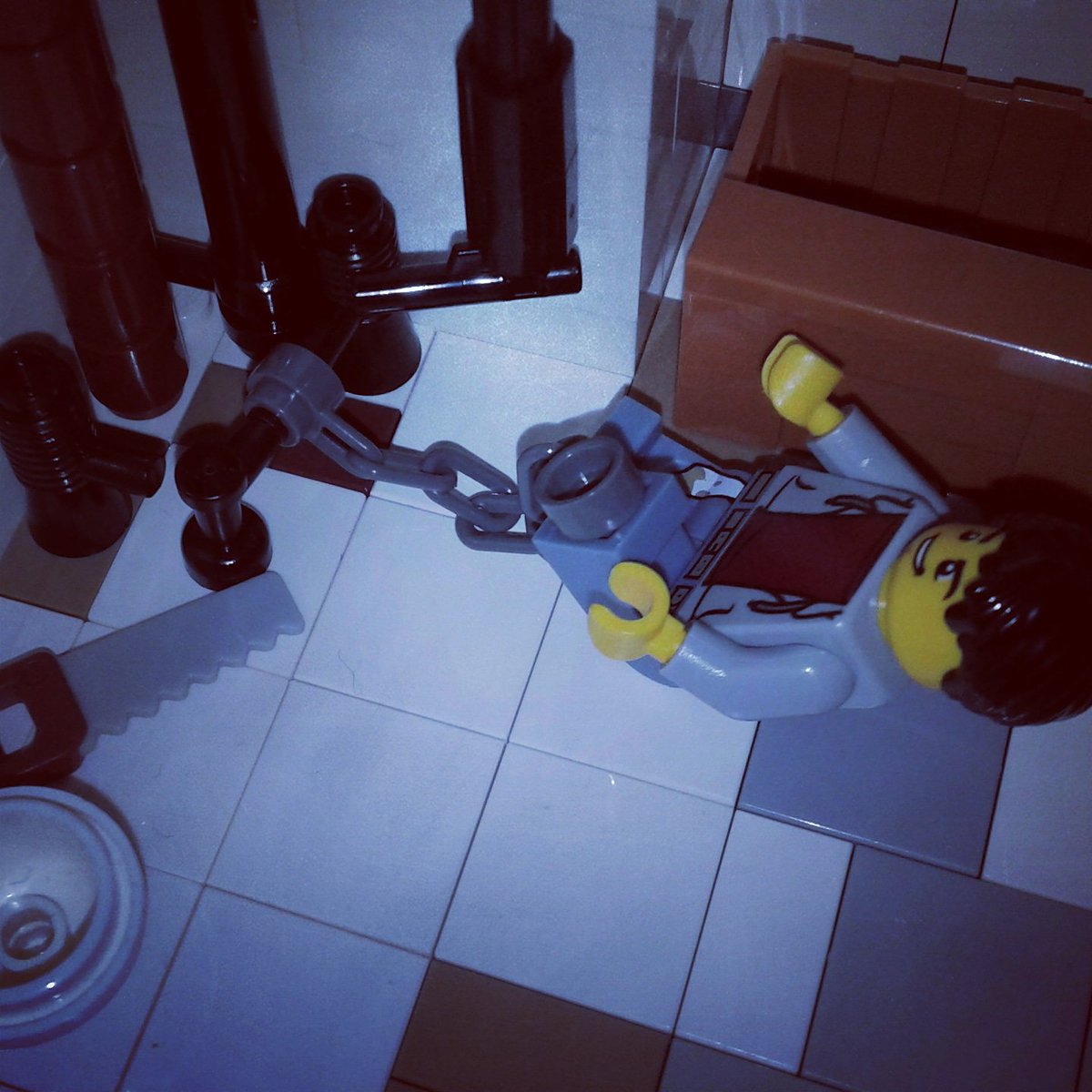 anthrbrcknAFOL's tweet photo. Adam chained to a pipe. #legohorror #Saw https://t.co/qMc8lCALCK