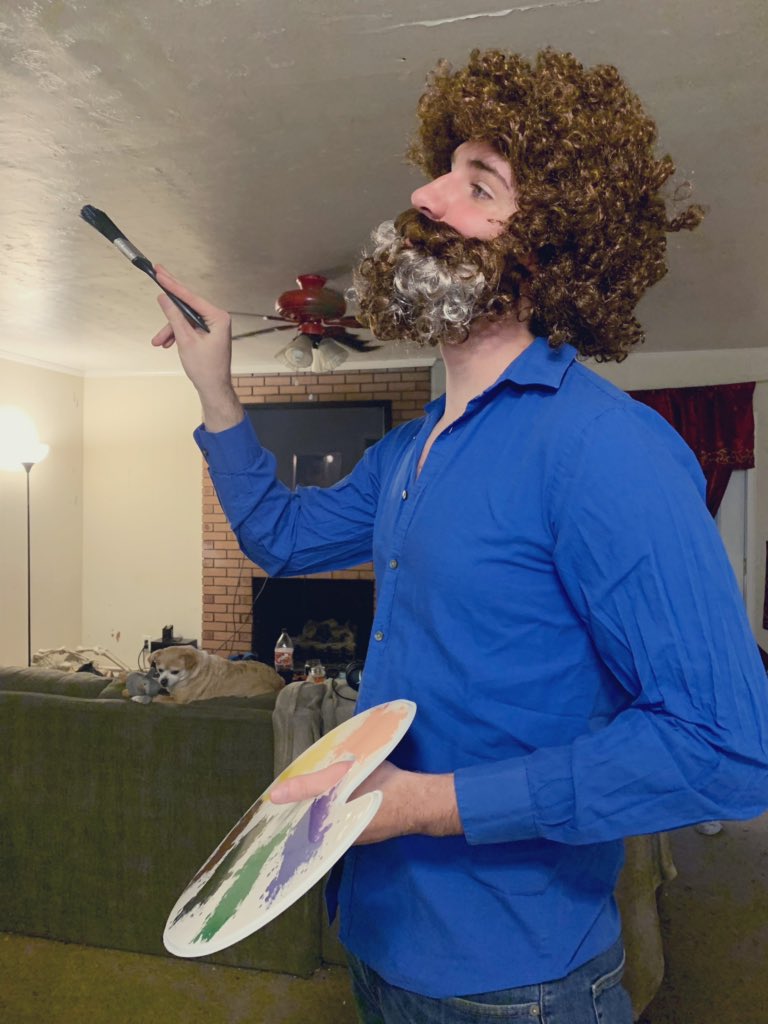 atom_bandit's tweet photo. My bf has to work this Halloween but they have a costume theme of “80s”. He dressed up as Bob Ross and already has regrets https://t.co/HiYJgDTNAG
