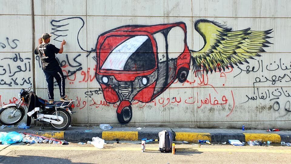 AliRafee86's tweet photo. #Graffiti on the walls of #Baghdad al-#Tahrir_Square 
#Iraq #Save_the_Iraqi_people #Toktok https://t.co/aO556fcxR9