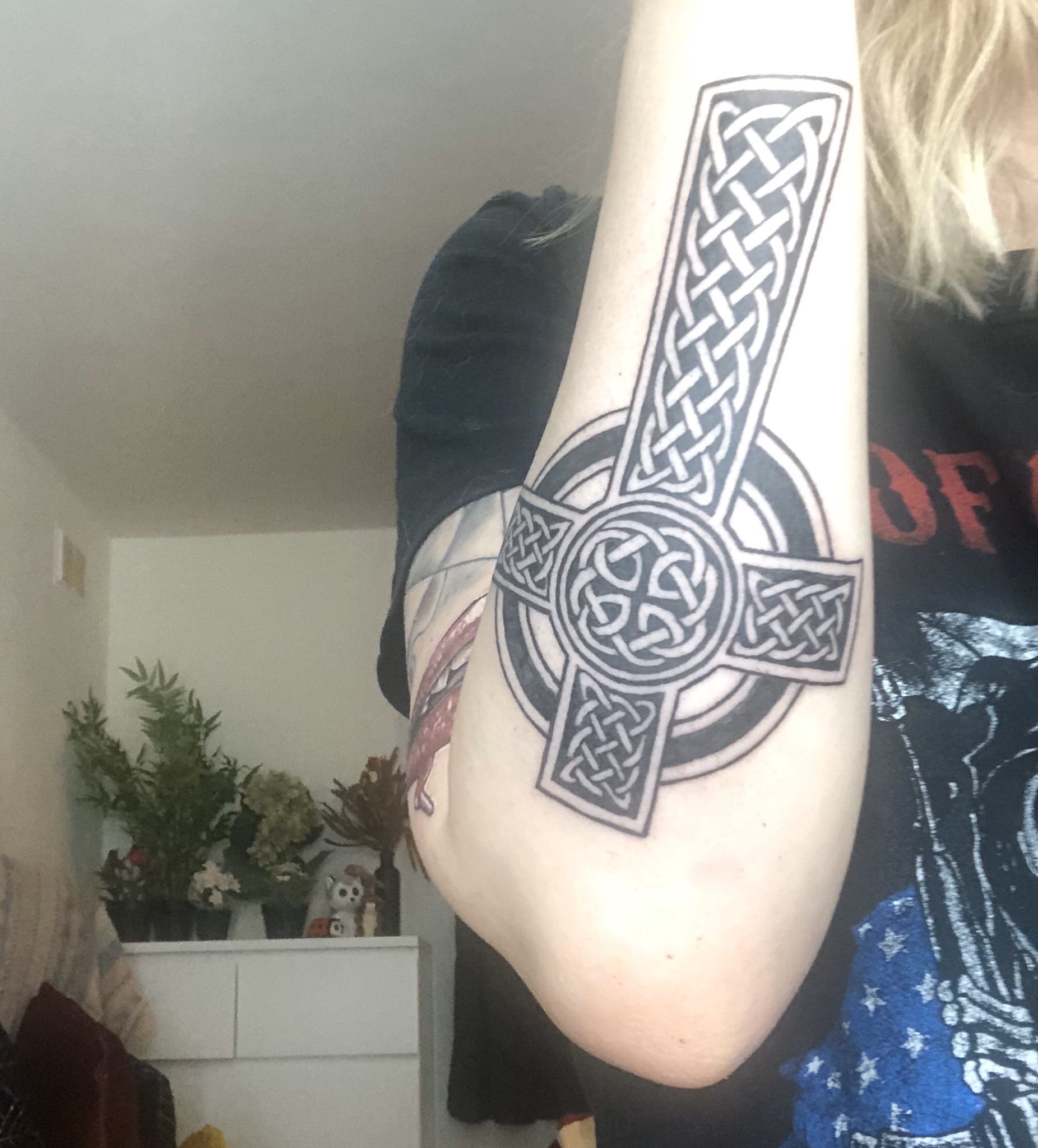 Celtic cross on my forearm with my sons name. Done by Chaz at Lucky Kat Tat  in Whiting, IN. : r/tattoos