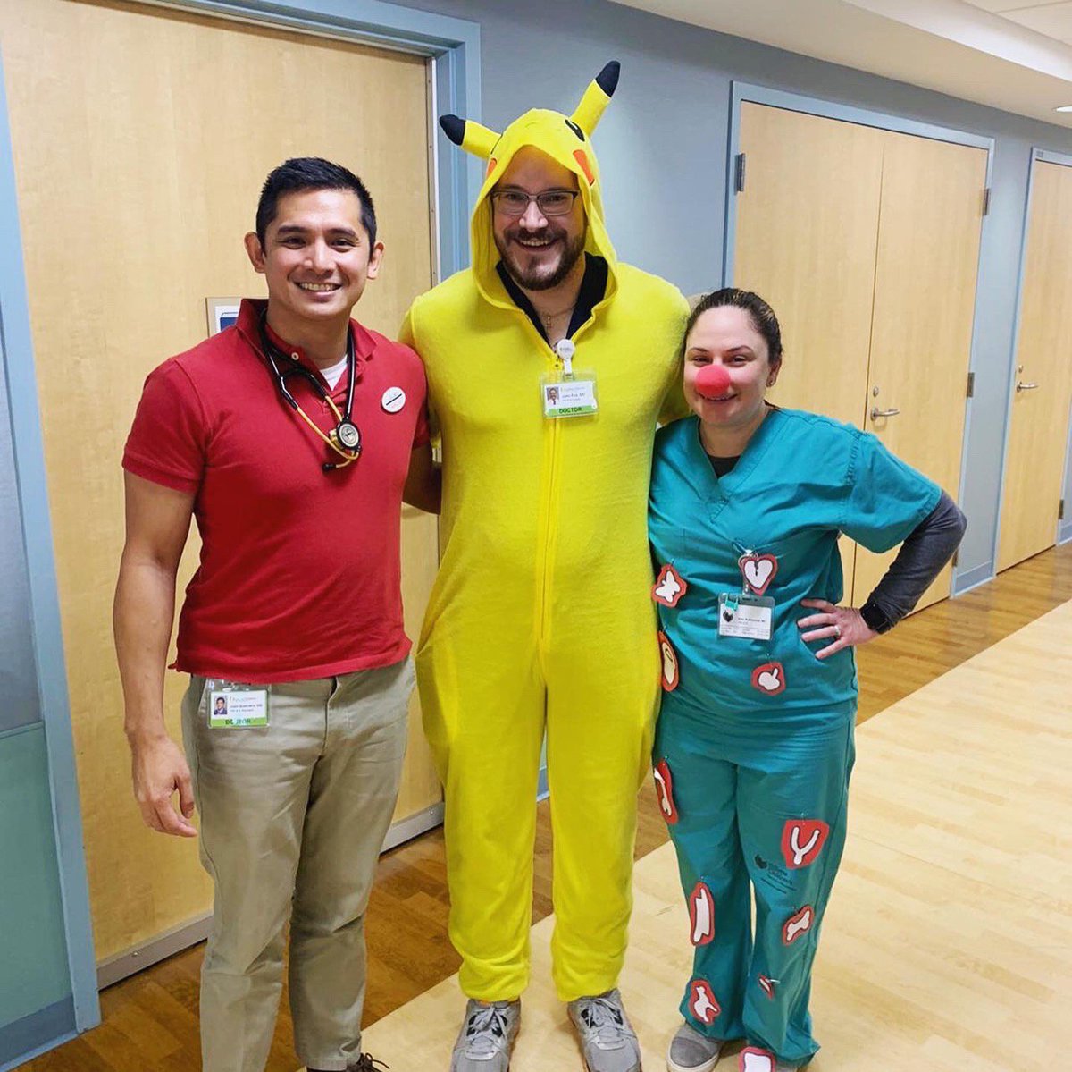 GopherPMR's tweet photo. No better place to be on Halloween than a children's hospital. @GilletteChildrn rehab floor got to have these three great rehab docs providing care on rounds today. @AAPMR @AAPhysiatrists #rehabisfun #Go4PMR https://t.co/PHYi2peBhS