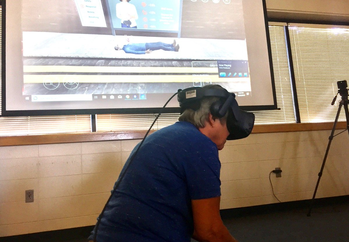 ebraun14's tweet photo. District Health Services Coor. Karen Schwind is SOLD on the effectiveness of @dualgoodhealth 's Basic Life Support training simulation with our @htcvive Pro! Next up...Curriculum, then (hopefully) on to our Ss. #ARVRinEDU is about to explode. Let's save some lives!#tec21 #edtech https://t.co/L0wIY4urcN