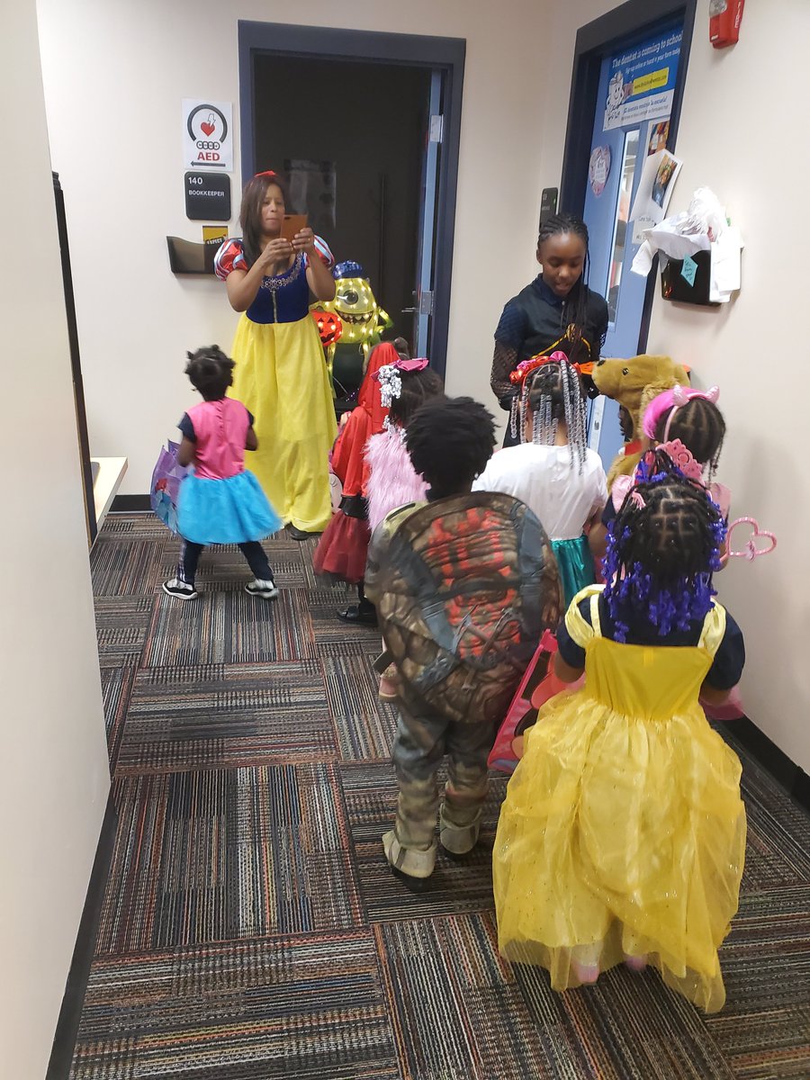LowerFisher's tweet photo. My babies had their first harvest fest with costumes!!! I think they had a ball!!! Oh and what's a leadership team meeting without the goodies!!! But wait, do we have an intruder peaking through the door???!!! https://t.co/mQa4unTsUR