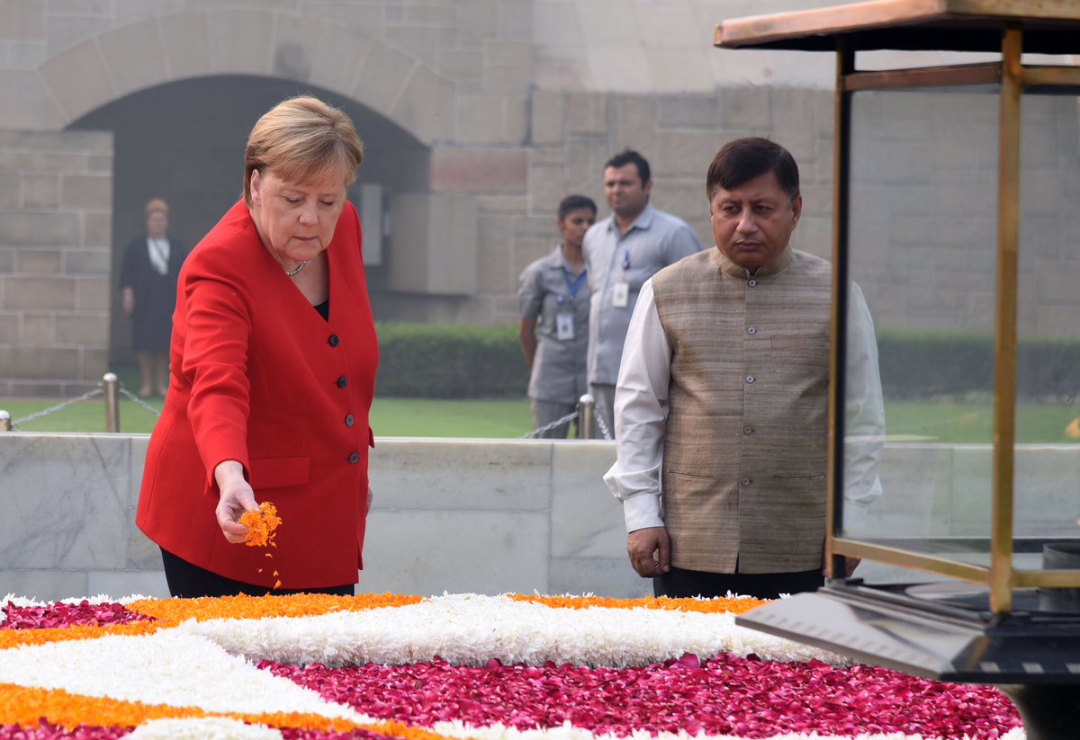 MEAIndia's tweet photo. Tribute to our father of the Nation
#German Chancellor Angela Merkel offered a wreath at Bapu’s samadhi at #Rajghat. https://t.co/A745MXtP3I