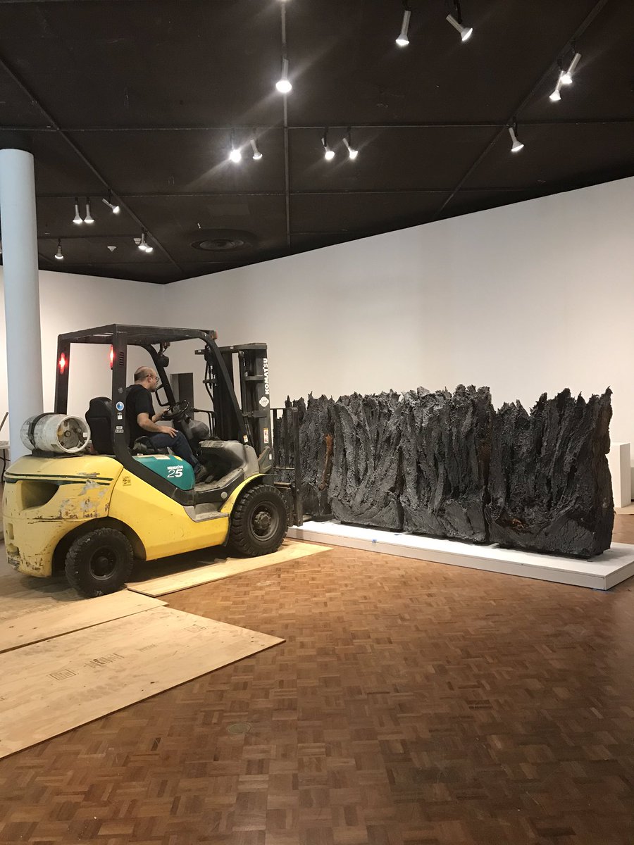 UHmanoa_art's tweet photo. Brad Evan Taylor’s show RIFT opens in our main art gallery this Sunday, Nov. 3, 2-5 pm @UHmanoa_art -- here he is yesterday setting four thousand-pound sculptures in place @uhmanoa https://t.co/hcjnBKXNep
