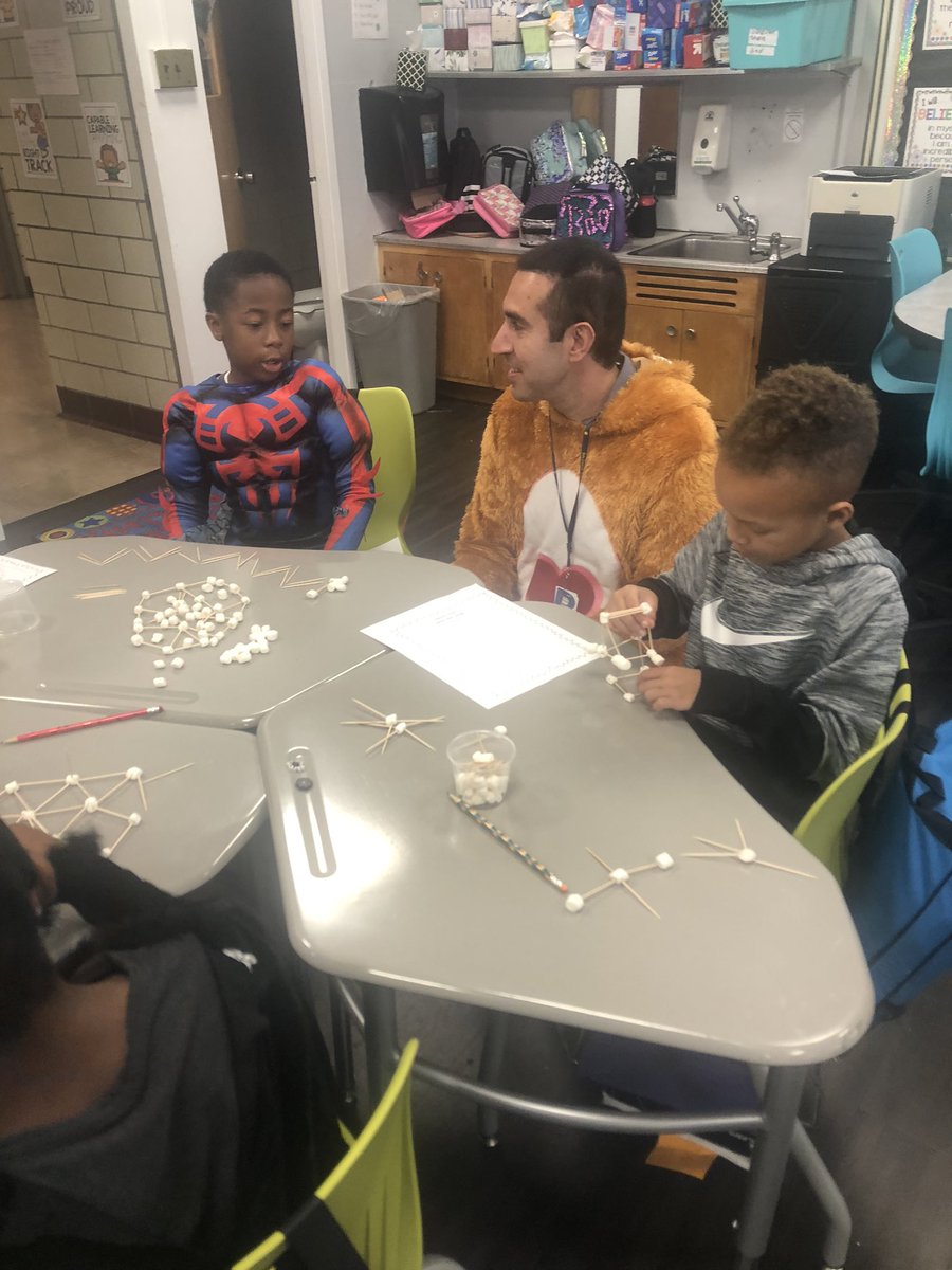 LaurenMaywald's tweet photo. After thoughtfully planning our designs, Ss constuct #spiderwebs and #hauntedhouses using #geometricfigures We even wrote some stories about them! #STEM #geometry #math #engineering #2May @UnalKarakas2 https://t.co/UT0uqek263