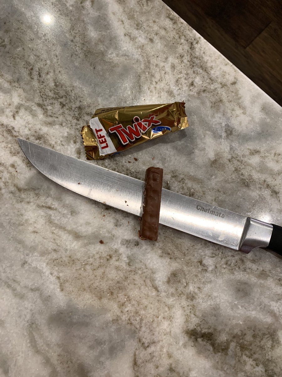 TheJeffW's tweet photo. @junior_miller @GeorgeDunham @gordonkeith Guys. Crazy that y’all JUST talked about this this morning. Kids got home from trick or treating, we open a Twix and well....: #EvilNeighbors #Halloween https://t.co/i57SJVyyr2