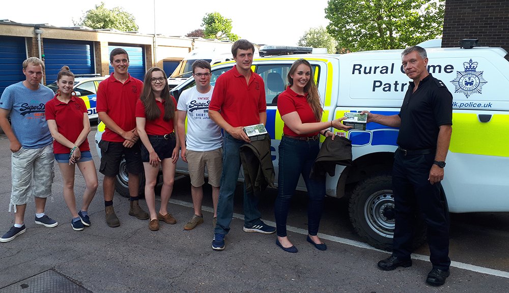 SuffolkPolice's tweet photo. A big thanks from the Rural Crime Team to all members &amp; supporters of Halesworth Young Farmers Club for their donation of trail cameras and waterproof trousers - a hugely appreciated gesture - looking forward to using the kit to catch offenders linked to rural &amp; wildlife crimes. https://t.co/cnqHeRiuzd