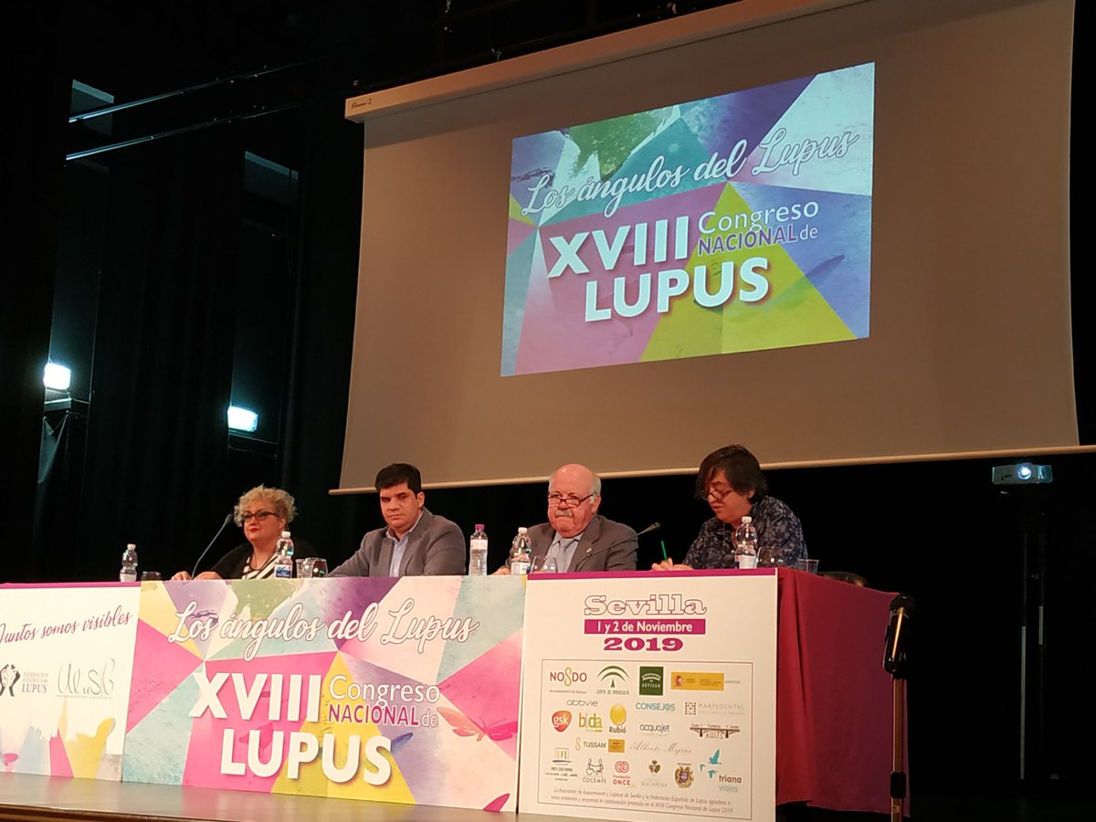alusevillaorg's tweet photo. Nuestra presidenta da la bienvenida a todos los asistentes así como su agradecimiento para El Consejero de Salud de la Junta de Andalucía Jesús Aguirre  y D. Antonio Sánchez del ayuntamiento de Sevilla por su colaboración en este evento. 
#18CNLupus https://t.co/xmTfwAXEei