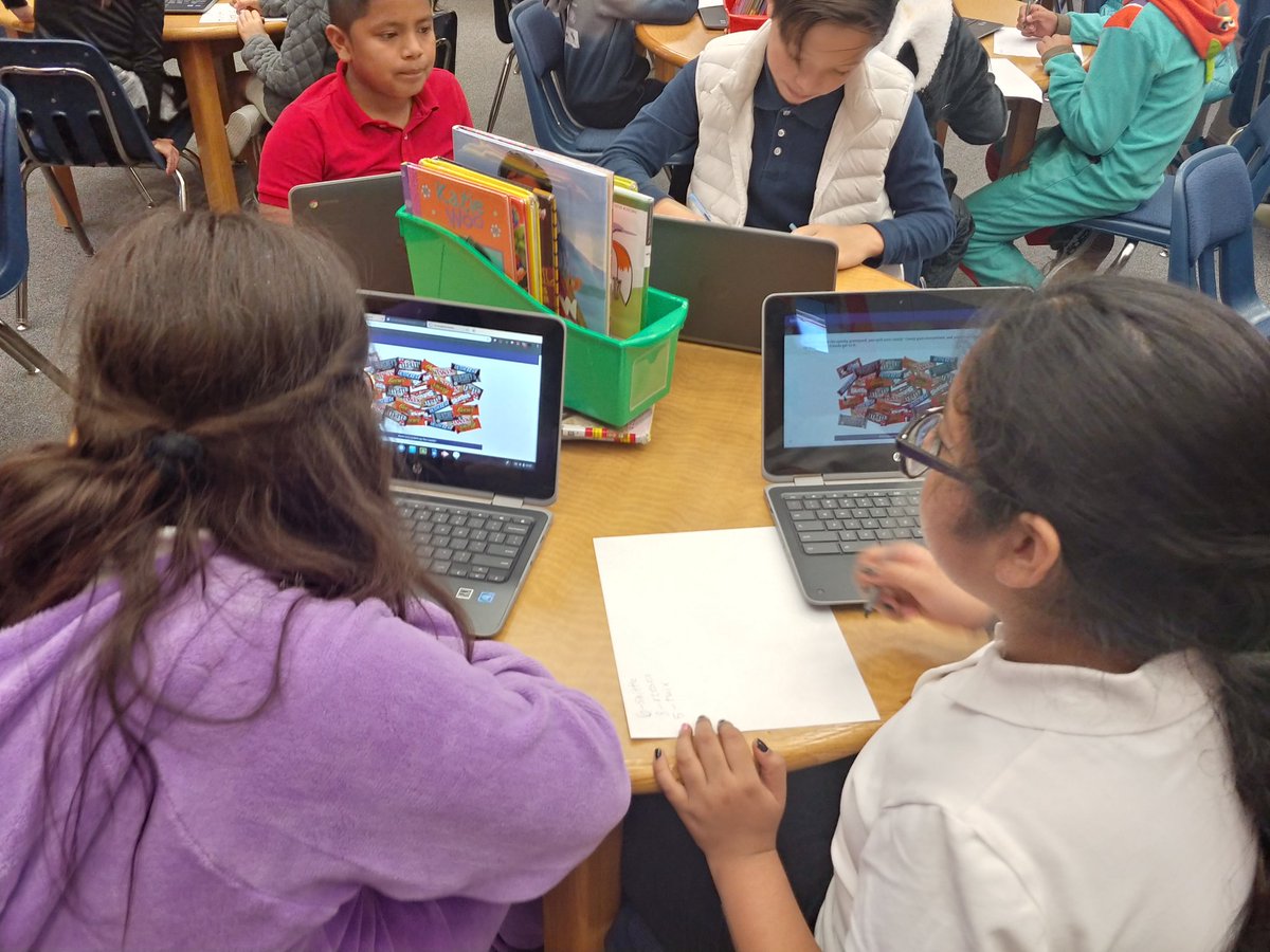 HollyK_EdTech's tweet photo. Coyotes at @McWhorterES engaged in a very spooky digital breakout during a library lesson. Teamwork and critical thinking at every table! #DLSedventures #mcwpln https://t.co/t0skZ7Kncc