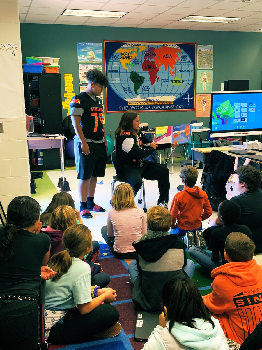 Steph_teaches's tweet photo. Just a little reading time &amp; Force &amp; Motion talk with the football players! The kids look up to them so much!! @SWOnslow @MVEMustang https://t.co/PJps9Sc63c
