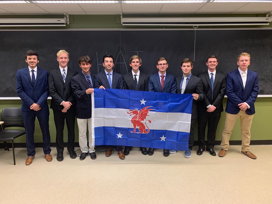 [Beta Flag Friday] To honor the local support they receive, the men of Theta Alpha (<a href="/beta_delaware/">Beta Theta Pi - University of Delaware</a>) initiated Risk Management Advisor Dave Christino, father of Chapter President Garret Christion, Delaware ’20, along with their most recent new member class.