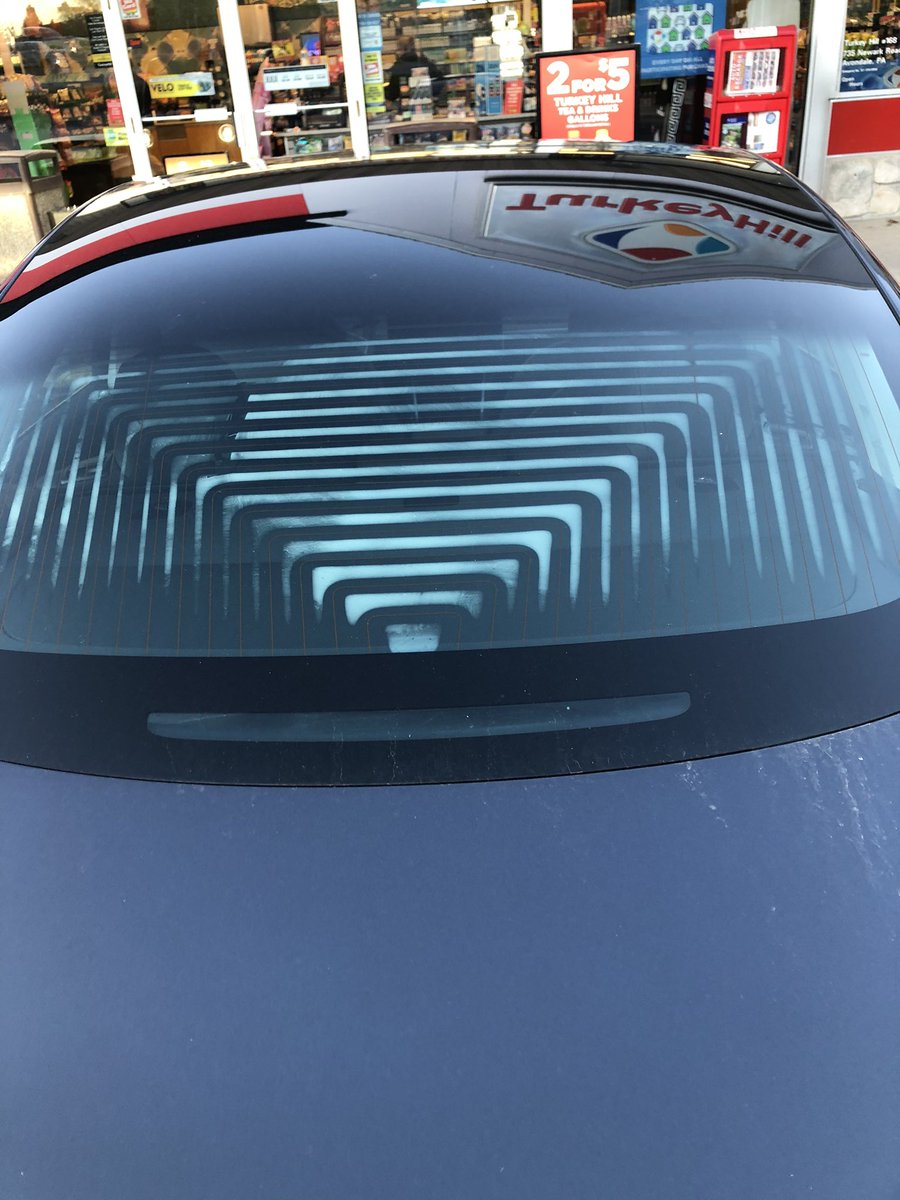 LongacreSuzanne's tweet photo. So @elonmusk, please confirm that the defroster is supposed to look like the @Tesla T!  I need to win the bet! https://t.co/np1f2mC56S