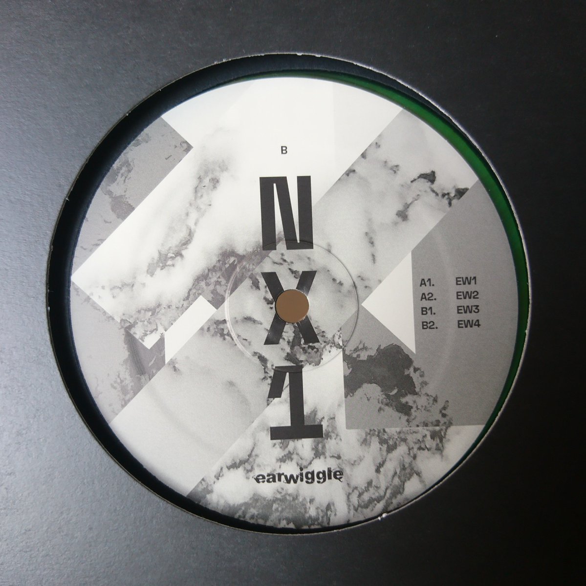 earwiggledublin's tweet image. NX1 - EW is out now (vinyl + digital). In shops everywhere, and locally at @AllCityRecordSt + @spindizzyrecord in Dublin / Temporary Pleasure in Galway. Also via our Bandcamp. Artwork: @ColinUnthink  earwiggle.bandcamp.com/album/nx1-ew