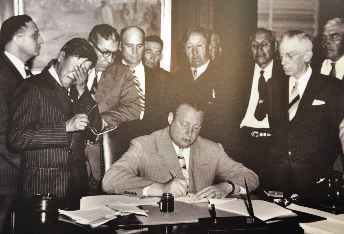 Ok, tidbits of knowledge for  #NativeAmericanHeritageMonthThis photo is famous in my tribe. It’s a photo of George Gillette weeping as he signs over 152,000+ acres of prime bottom lands prior to the building of the Garrison Dam, something like 70 miles from where I live just