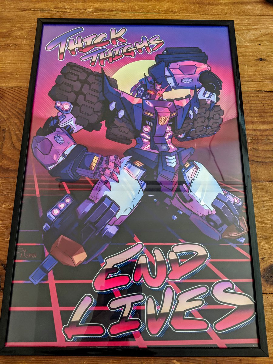Tatzelwurx's tweet photo. My FAVORITE piece of swag from #TFConDC ๐๐ He'll get a better frame later - took Gandalf's frame for now. Thank you @Sisi_Esprit for this AMAZING print!! I absolutely LOVE IT!! https://t.co/BnChYqxlDI