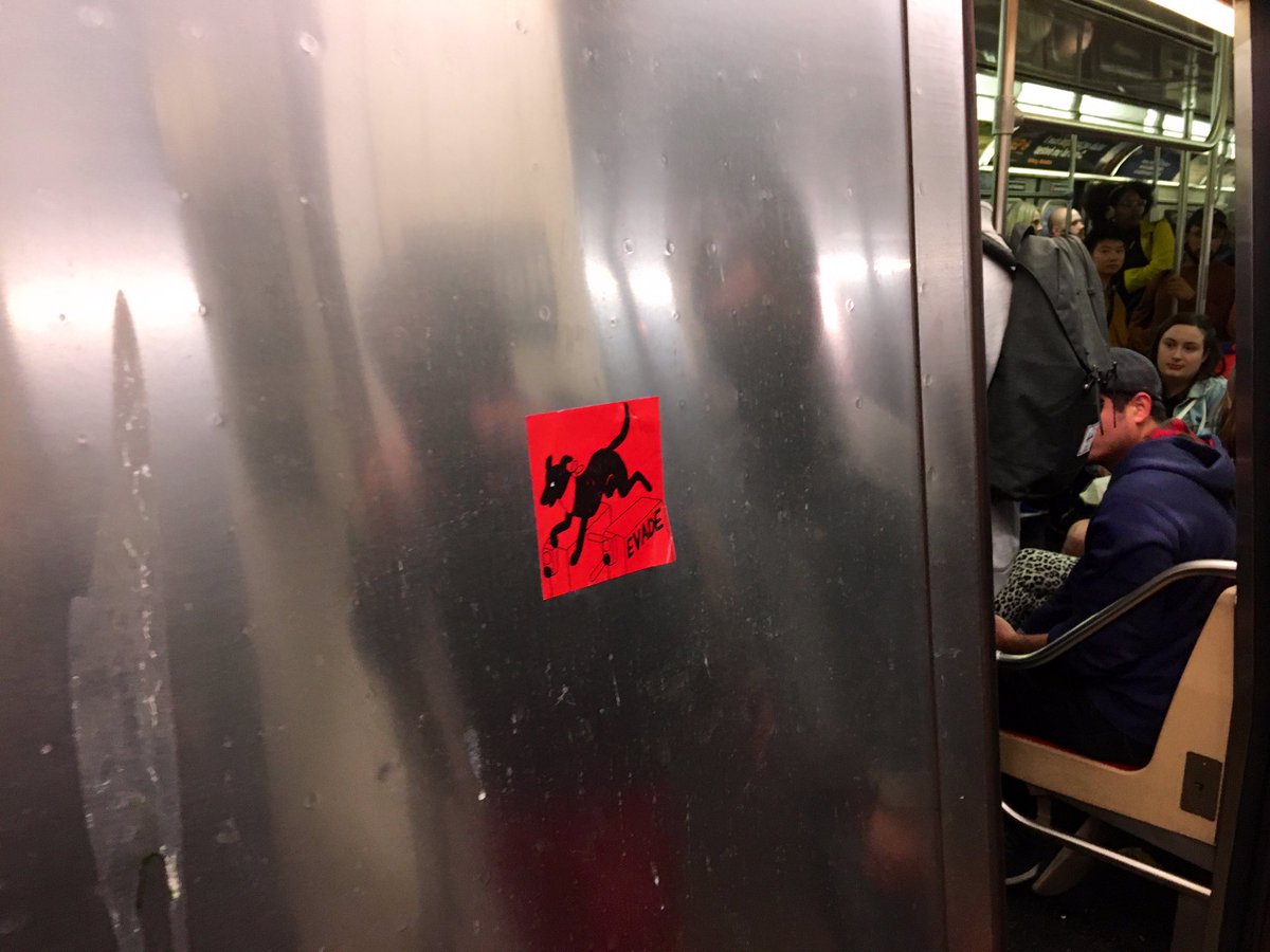 AshAgony's tweet photo. Protesters decorated the walls & trains during the #FTP march in Brooklyn earlier tonite. You can tell that they were inspired by the #EvasionMasiva protests in Chile. #SwipeItForward https://t.co/8wL1yLobe0