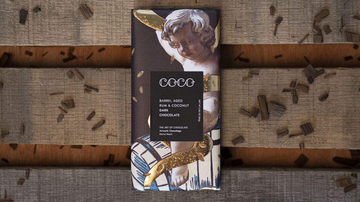 COCO - The Art of Chocolate (@cocochocolatier) on Twitter photo #ProjectAmpersand | COCO & <a href="/David_Mach/">David Mach</a> | The design features an angel sitting on beer barrels representing the “heavenly combination of beer & chocolate”. As a homage to <a href="/innisandgunn/">Innis & Gunn</a>'s beer flavours, the #chocolate bar has ingredients of the brewing process across its wrapper. #ProjectAmpersand | COCO & <a href="/David_Mach/">David Mach</a> | The design features an angel sitting on beer barrels representing the “heavenly combination of beer & chocolate”. As a homage to <a href="/innisandgunn/">Innis & Gunn</a>'s beer flavours, the #chocolate bar has ingredients of the brewing process across its wrapper.