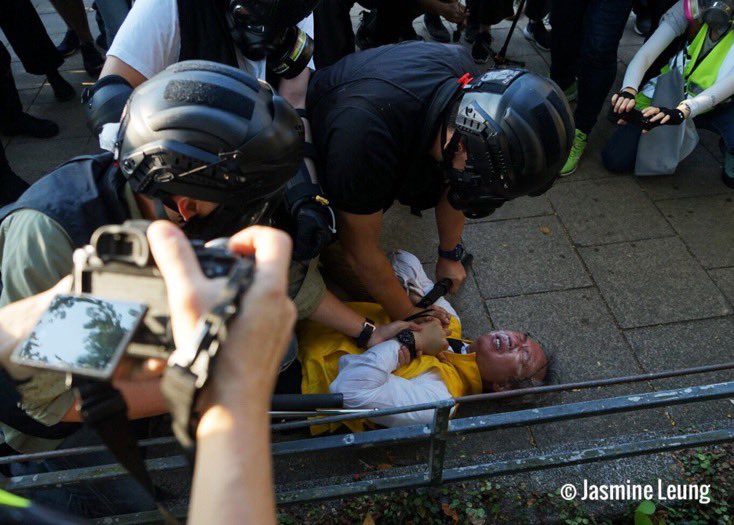 MHiesboeck's tweet photo. Nov 2 in Hong Kong: thousands in the street in both peaceful and violent protests, lots of teargas, random arrests of hundreds of civilians and multiple pro-democracy council candidates ARRESTED in the most brutal way. 
#CPC is turning HK into a police state. @HawleyMO @iingwen https://t.co/fG6lmP8ZAK