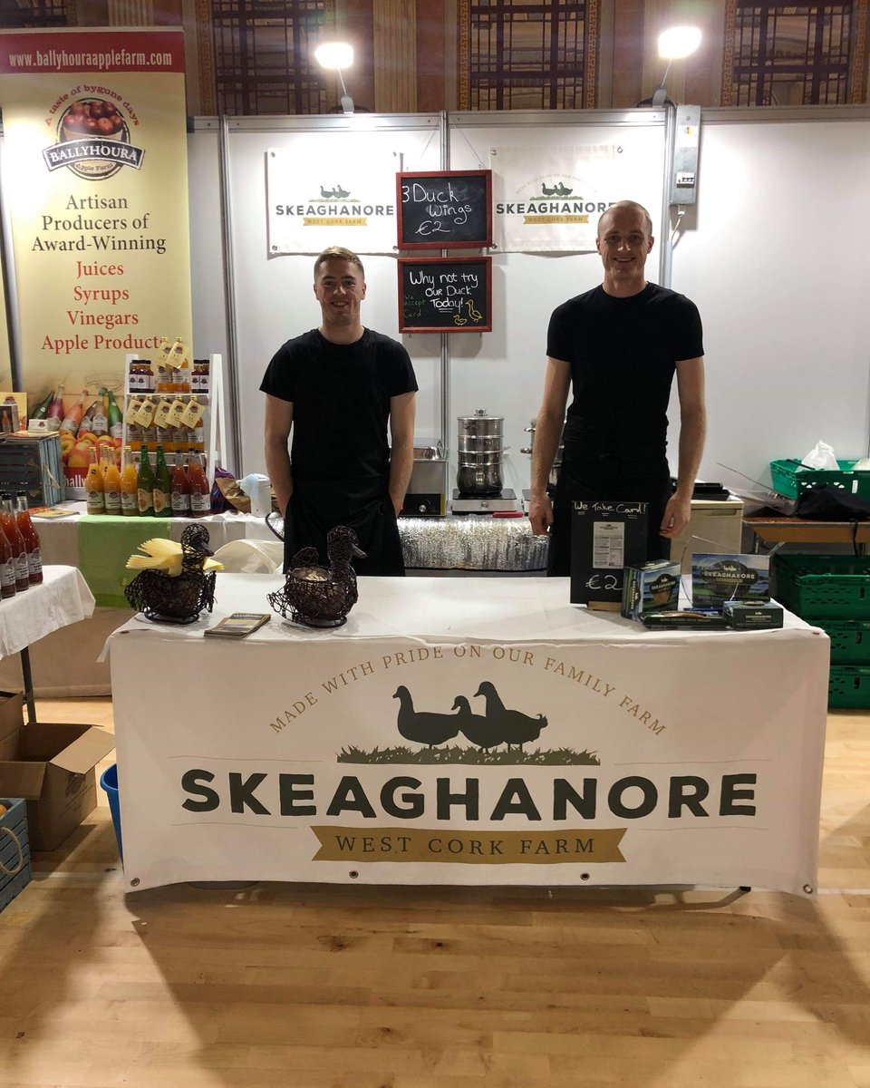SkeaghanoreDuck's tweet photo. Daniel and Joseph serving the front line today for @corkkerryfoodmarket. Call in to Cork city hall, have a chat with Helena while munching on some delicious wings.  #localfood #corkkerryfoodmarket #corkcity https://t.co/un2I7eLM7I
