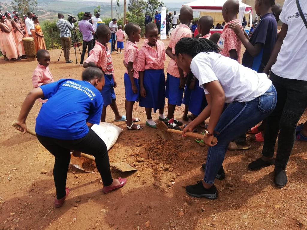RCkigalicity's tweet photo. Service becomes fun when the beneficiaries can't wait for the completiok. Ladies at work as the #NyacyongaPhase2 is underway at the Nyacyonga Primary School. #RCKCProjects, #EducateForChange https://t.co/QrMg3yJwL3
